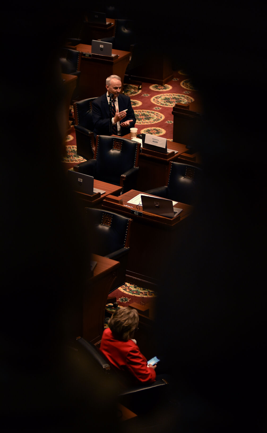 Rep. Doug Richey speaks with Kirk Mathews
